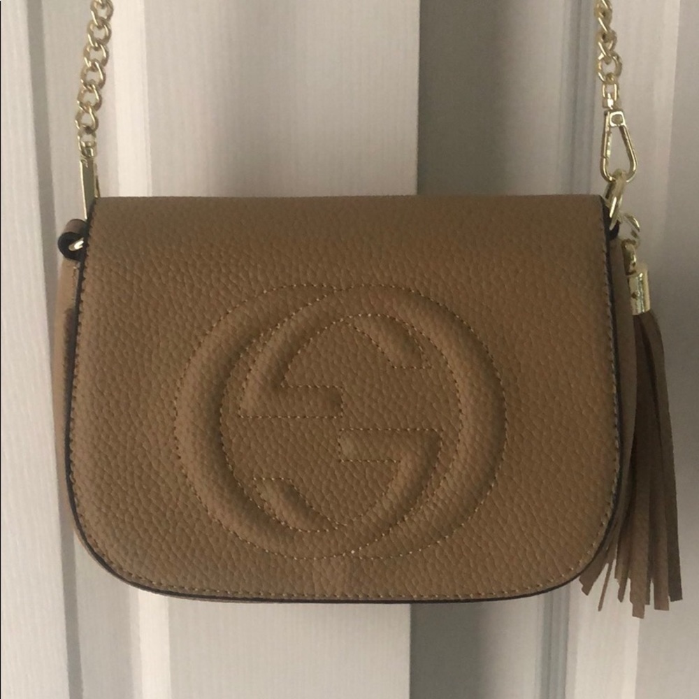 Tan Gucci bag